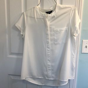 Lightweight cream blouse smoke free home.